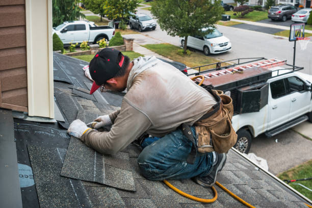 Professional Roofing technician working in Marshall, IL